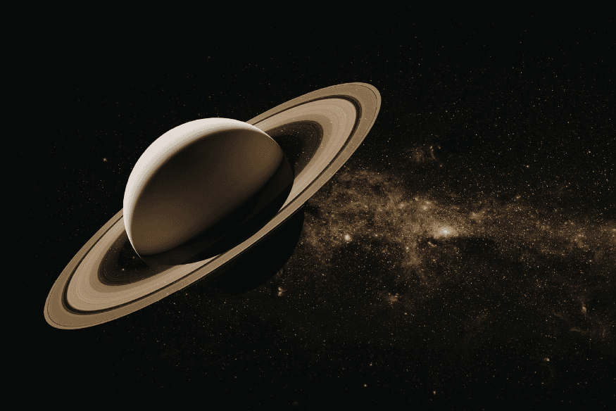 Saturno com seus anéis no espaço, exemplo de planeta gigante cuja imponência contrasta com o enorme interesse científico de suas luas